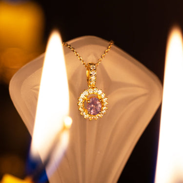 0.32ct natural alexandrite pendant with diamond halo set in 18k yellow gold chain